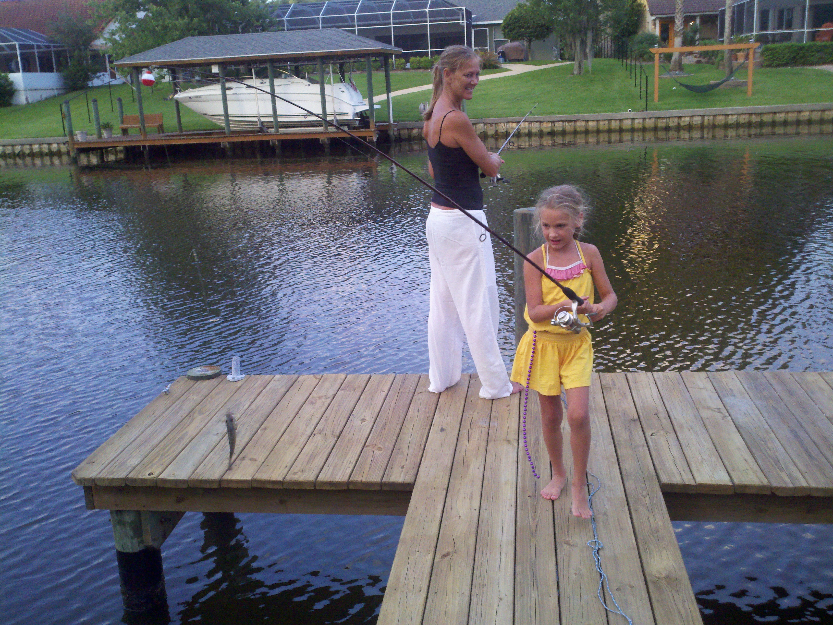 Photo of people on a boat dock